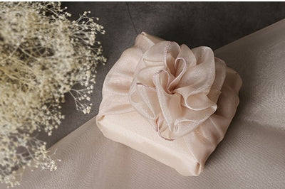 Coral lucid Bojagi wrapping cloth is perfect for formal events such as weddings, and adds a nice neutral touch to fabric wrapping paper.