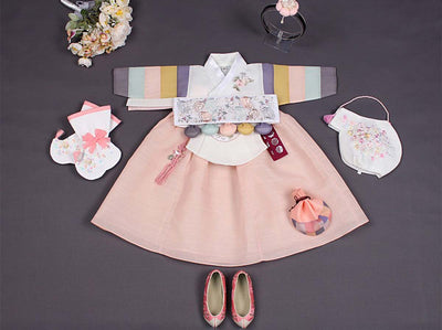 Lovely baby girl hanbok with colorful sleeves which is commonly known as a Saekdong Jeogori to Koreans.