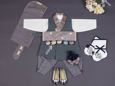 Handsome baby boy hanbok in green. This is a unique hanbok with a bronze collar to add a special visual effect.