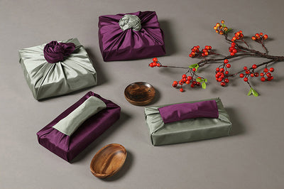 The deep purple & khaki double sided Bojagi is luxury gift wrap that'll brighten up any Korean festivity with clas