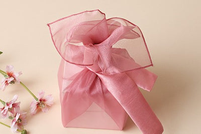 Ideallic for Valentine's Day, Christmas, or Seollal, this dark salmon lucid Bojagi luxury gift wrap is blushing and playful. 