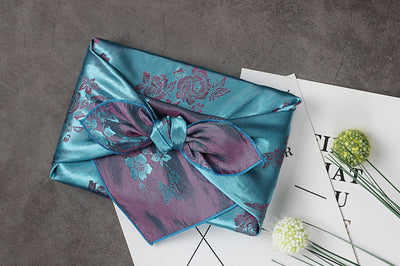 Aquamarine and gray floral double sided Bojagi is the ideal fabric wrapping paper for weddings and baby boy Doljanchi. Tie off a bow at the end to make it an even more sophisticated look.