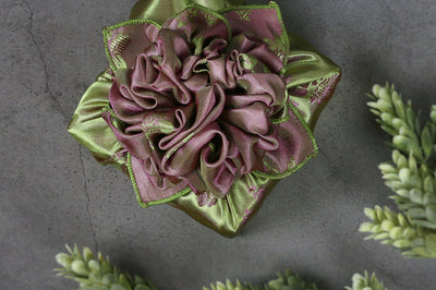 The dark jade and wine colored floral double sided Bojagi is a rich and lively fabric wrapping cloth that can be used during any Korean festivities. 