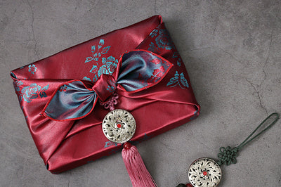 This dark red and bluish-gray double sided floral Bojagi for sale on our website looks stunning underneath a Christmas tree. 