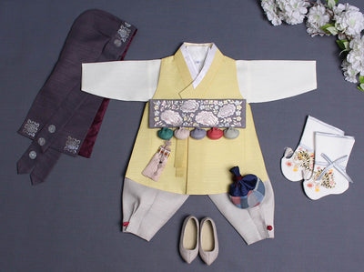 This image shows you the entire baby boy hanbok in lemon and shows you the high quality of our Korean hanboks.