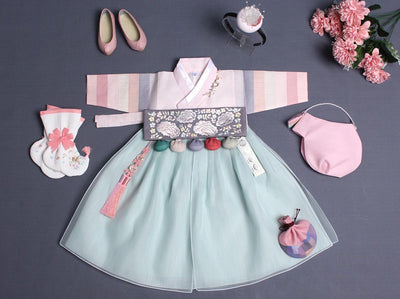 A baby girl that wears this cyan and rosey baby girl hanbok in short version is going to be showered with love and attention due to the pureness of the outfit.