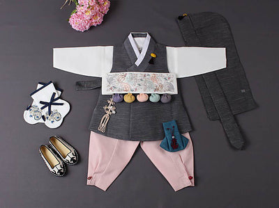 Handsome baby boy hanbok in Dark gray with complete set option. This comes with peach pants and gray hat with compliments the hanbok and makes it an appropriate dol hanbok.