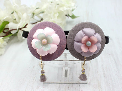 The violet/white and gray mini pumpkin floral hairband is a cute final touch for a young girl attending a fall Korean ceremony.