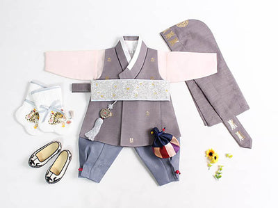 Noble baby boy hanbok with gray vest and a white jeogori. This baby boy hanbok is a prized hanbok and even includes a national Korean animal, the tiger, socks as part of its complete set.