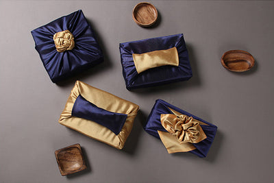 Conclude wrapping presents with fabric using this gold & navy double sided Bojagi Korean.